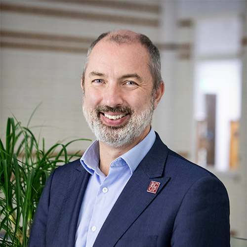 A square head and upper body photograph of RCGP Officer Dr Michael Mulholland.