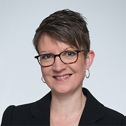 A professional head and shoulders image of Professor Sonia Cottom with cropped hair and glasses.