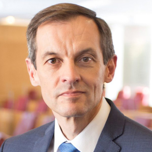 A close-up image of RCGP President Dr Richard Vautrey wearing a suit and tie.