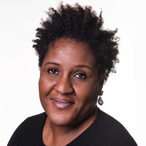 A close-up head and shoulders photograph of Professor Margaret Ikpoh wearing a black top.