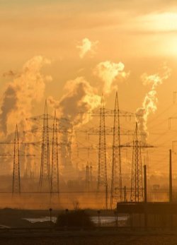 A small card image of an urban landscape at sunset.