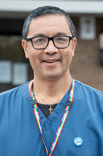 Headshot of Dr Adrian Hayter.