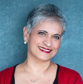 Headshot of Professor Kamila Hawthorne from the shoulders up, smiling and head is slightly tilted to the right. 