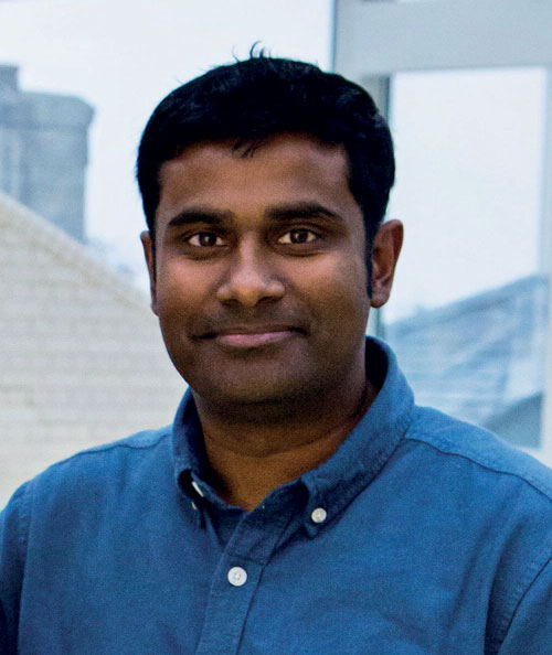 A head and shoulder image of GP Dr Hareen de Silva with sky behind him.